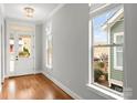 Bright foyer with hardwood floors, white trim, and natural light streaming through the windows at 917 Herrons Ferry Rd, Rock Hill, SC 29730