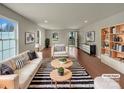 Bright living room with hardwood floors, neutral walls, and modern furnishings at 2006 Durand Rd, Fort Mill, SC 29715