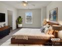 Comfortable main bedroom with soft lighting and plush bedding at 2006 Durand Rd, Fort Mill, SC 29715