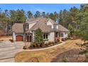 Beautiful home with meticulous landscaping and a three car garage at 4009 Beechwood Spring Ln, Belmont, NC 28012
