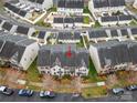 Aerial view of the townhome showcasing its location within a well-maintained community at 6936 Colonial Garden Dr, Huntersville, NC 28078