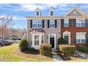 Attractive exterior of the townhome with a well manicured lawn at 7364 Laurel Valley Rd, Charlotte, NC 28273