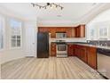 Spacious kitchen featuring stainless steel appliances and wooden cabinets at 7364 Laurel Valley Rd, Charlotte, NC 28273