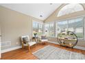 Sunroom featuring large windows, vaulted ceilings, and ample natural light at 824 Wynnshire Dr # D, Hickory, NC 28601