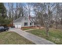 Well-maintained home with a two-car garage and long driveway at 2201 Holly Ln, Shelby, NC 28150