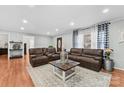 Bright living room featuring hardwood floors, stylish furnishings and natural light at 24253 Old Aquadale Rd, Albemarle, NC 28001