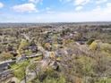 Aerial view of neighborhood with tree lined streets and homesites at 311 3Rd Avenue Se Dr, Hickory, NC 28602