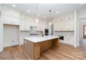 Bright kitchen with a large island, custom cabinets, and modern appliances for the inspired home chef at 558 Edmunds Ln # 41, Clover, SC 29710