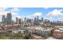 Aerial view of the city skyline, showing the apartment buildings and urban landscape at 710 W Trade St # 309, Charlotte, NC 28202