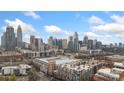 High angle view of the buildings, the city skyline, and beautiful clear skies at 710 W Trade St # 309, Charlotte, NC 28202
