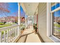 Wide, covered front porch featuring classic white columns and plenty of space for outdoor enjoyment at 122 Blandina Ct, Fort Mill, SC 29708