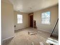 Unfinished bedroom with natural light streaming through windows at 1600 Julia Maulden Pl, Charlotte, NC 28206