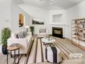 Bright living room with fireplace, stylish furniture, and neutral decor for a cozy and inviting space at 2924 Zion Renaissance Ln, Charlotte, NC 28269