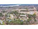 Aerial view of 303 Ridge Reserve Dr, nestled within a lush green canopy and overlooking the lake at 303 Ridge Reserve Dr # 29, Clover, SC 29710