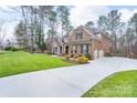 Beautiful brick home with a long driveway and well-manicured lawn in a desirable neighborhood at 303 Ridge Reserve Dr # 29, Clover, SC 29710