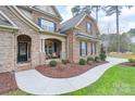 Inviting front porch with seating and attractive landscaping, enhancing the home's curb appeal and welcoming atmosphere at 303 Ridge Reserve Dr # 29, Clover, SC 29710