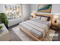 Comfortable main bedroom with a large window, stylish decor, and cozy furnishings at 4219 Robinwood Dr, Charlotte, NC 28212