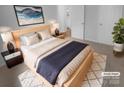 Cozy bedroom with a queen bed, soft carpet, and natural light at 6809 Brancusi Ct, Charlotte, NC 28215