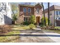 Beautiful brick home featuring a driveway and landscaped front yard at 732 Ellsworth Rd, Charlotte, NC 28211