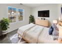 Bright bedroom featuring modern minimalist design, decor, neutral colors, and plenty of natural light at 13424 Kibworth Ln, Charlotte, NC 28273