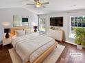 Bright bedroom with hardwood floors, large windows and a ceiling fan at 1419 Deer Forest Dr, Fort Mill, SC 29707