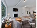 Bright living room featuring a fireplace, large window, and open concept design at 775 Bridgewood Dr, Rock Hill, SC 29732