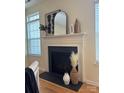 Elegant fireplace with stylish decor and accents, creating a cozy ambiance at 6410 Hasley Woods Dr, Huntersville, NC 28078