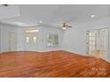 Open living room with hardwood floors and fireplace, perfect for entertaining guests at 1030 Hurley School Rd, Salisbury, NC 28147