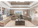Bright and airy living space with a large window, built-in shelving, and a view of the outdoors at 16455 Harbor View Rd, Charlotte, NC 28278