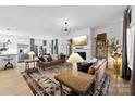 Bright living room with stylish furnishings, fireplace, and seamless open-concept layout at 4114 Rutgers Ave, Charlotte, NC 28206