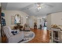 Inviting living room with hardwood floors, vaulted ceilings, and an open layout to the front door at 121 Yorkshire Dr, Salisbury, NC 28144