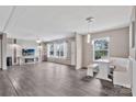 Spacious living area with modern flooring, ample windows, and built-in dining nook at 1317 Liberty Rd, Chester, SC 29706