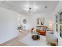 Bright living room with neutral walls, modern lighting, and stylish furniture creating a comfortable living space at 327 Berry St, Rock Hill, SC 29732