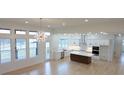 Open-concept kitchen features an island, stainless steel appliances, and recessed lighting at 4227 Holly Ne Cir, Conover, NC 28613