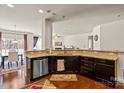 Spacious kitchen offering ample counter space, stainless steel appliances, and seamless flow to the living areas at 10714 Sapphire Trl, Davidson, NC 28036