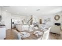 Open concept dining area is perfect for entertaining, connecting to the kitchen and living room at 469 Court House Ave, York, SC 29745