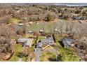 Aerial view of lakeside homes featuring well-manicured lawns and direct access to the beautiful waters of Lake Norman at 5064 Lynwood Rd, Sherrills Ford, NC 28673