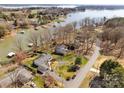 Expansive aerial view of waterfront homes on Lake Norman, showcasing lake access and mature trees at 5064 Lynwood Rd, Sherrills Ford, NC 28673