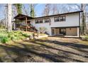 Inviting exterior elevation showcases a covered porch, open carport, and lovely landscaping at 910 Forest Dr # 14, Lancaster, SC 29720