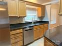 Updated kitchen with stainless steel appliances, granite countertops, oak cabinets, and ample storage space at 3195 Reservation Rd, Rock Hill, SC 29730
