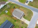 Aerial view of the home features a fenced backyard with a playground and shed at 552 Montgomery Dr, Rock Hill, SC 29732