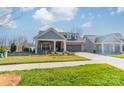 Inviting single-Gathering home with a well-maintained lawn and appealing curb appeal at 1005 Headwaters Ct, Matthews, NC 28104