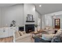 Cozy living room with a fireplace, and stylish decor, perfect for relaxation at 3324 Flamingo Ave, Charlotte, NC 28205