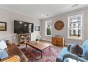 Bright living room with hardwood floors and a cozy atmosphere, perfect for relaxation at 118 Mint Ave # B, Mooresville, NC 28117