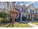 Charming townhome with well-maintained lawn and mature landscaping, offering great curb appeal at 2249 Cigar Ct, Charlotte, NC 28273