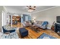 Spacious living room with hardwood floors, comfortable seating, and ample natural light at 3119 18Th Ne St, Hickory, NC 28601