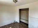Bedroom with laminate flooring, closet and fresh paint potential at 314 N Little Texas Rd, Kannapolis, NC 28083