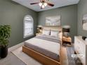 Cozy staged bedroom featuring a large window and neutral decor at 3865 Granite St, Terrell, NC 28682