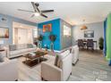 Bright living room with open layout to the dining room and kitchen at 9427 S Vicksburg Park Ct, Charlotte, NC 28210