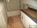 Bathroom features a tub and vanity at 122 Peppervine Ln, Statesville, NC 28625